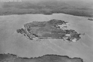 Ford Island in 1925, showing U.S. Army's Luke Field on the left side and growing Navy facilities on the right side.
