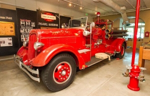 CINDY ELLEN RUSSELL / CRUSSELL@STARADVERTISER.COM A Honolulu Fire Department engine that responded to the Pearl Harbor attack on Dec. 7, 1941, is one of the attractions at the Honolulu Fire Museum and Education Center in the historic fire station at 620 South St. The museum will be open for free guided tours every third Saturday, with reservations required. 