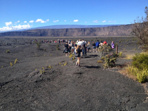 Credit: NPS photo. Visitors explore the floor of Kilauea caldera on the “Into the Volcano” ranger-guided hike. This hike, one of the park’s most popular, will be offered on January 23 as part of the Centennial Hike Series at Hawaii Volcanoes National Park. 