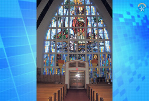 COURTESY MASON ARCHITECTS INC. Stained glass at St. Augustine Church depicts its namesake.